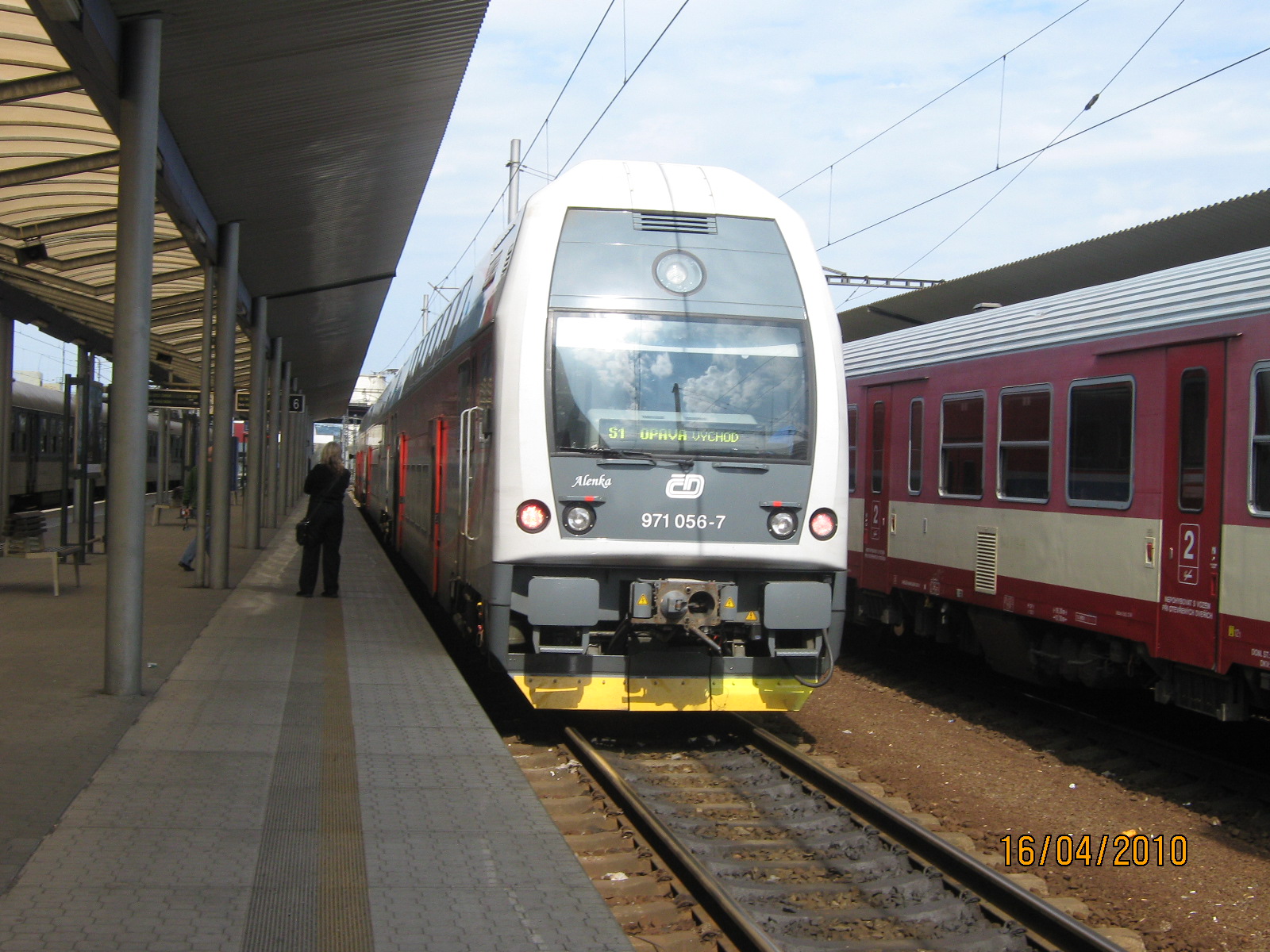 971 056-7